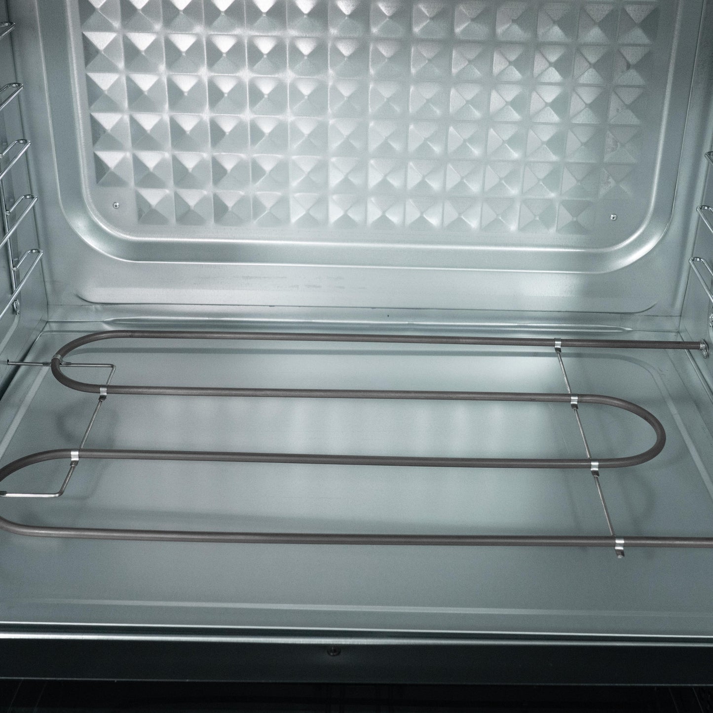 The Baker ESMX-100P accessories: food tray, wire rack, crumb tray, rotisserie fork and handle