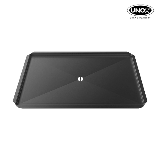 Non-stick commercial tray with central hole to convey the food liquids and greases towards the commercial oven’s drain. XUC046.