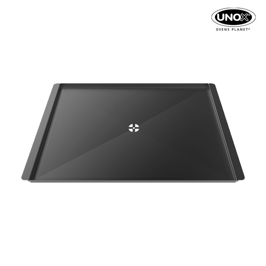 Non-stick commercial tray with central hole to convey the food liquids and greases towards the commercial oven’s drain. XUC047.