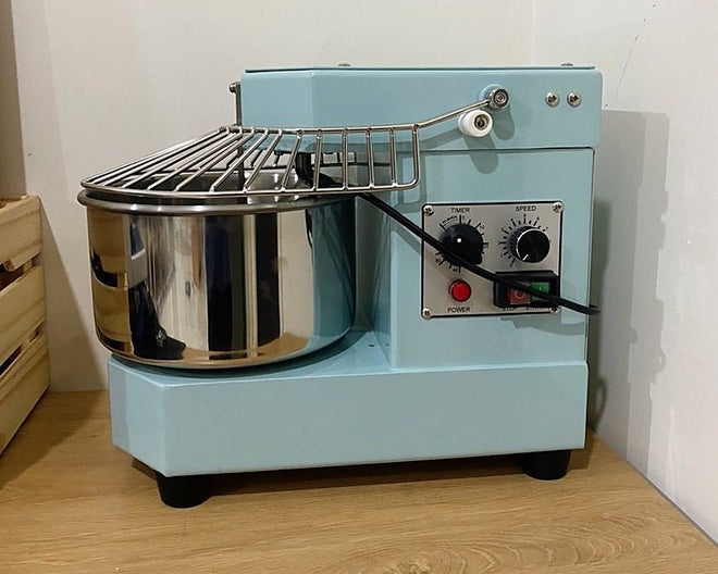 Customer photo of a blue Golden Chef DH-8W spiral mixer on a kitchen counter